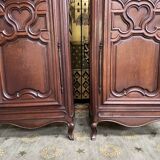 Pair of Louis XV style bonnetière in solid oak 19th century