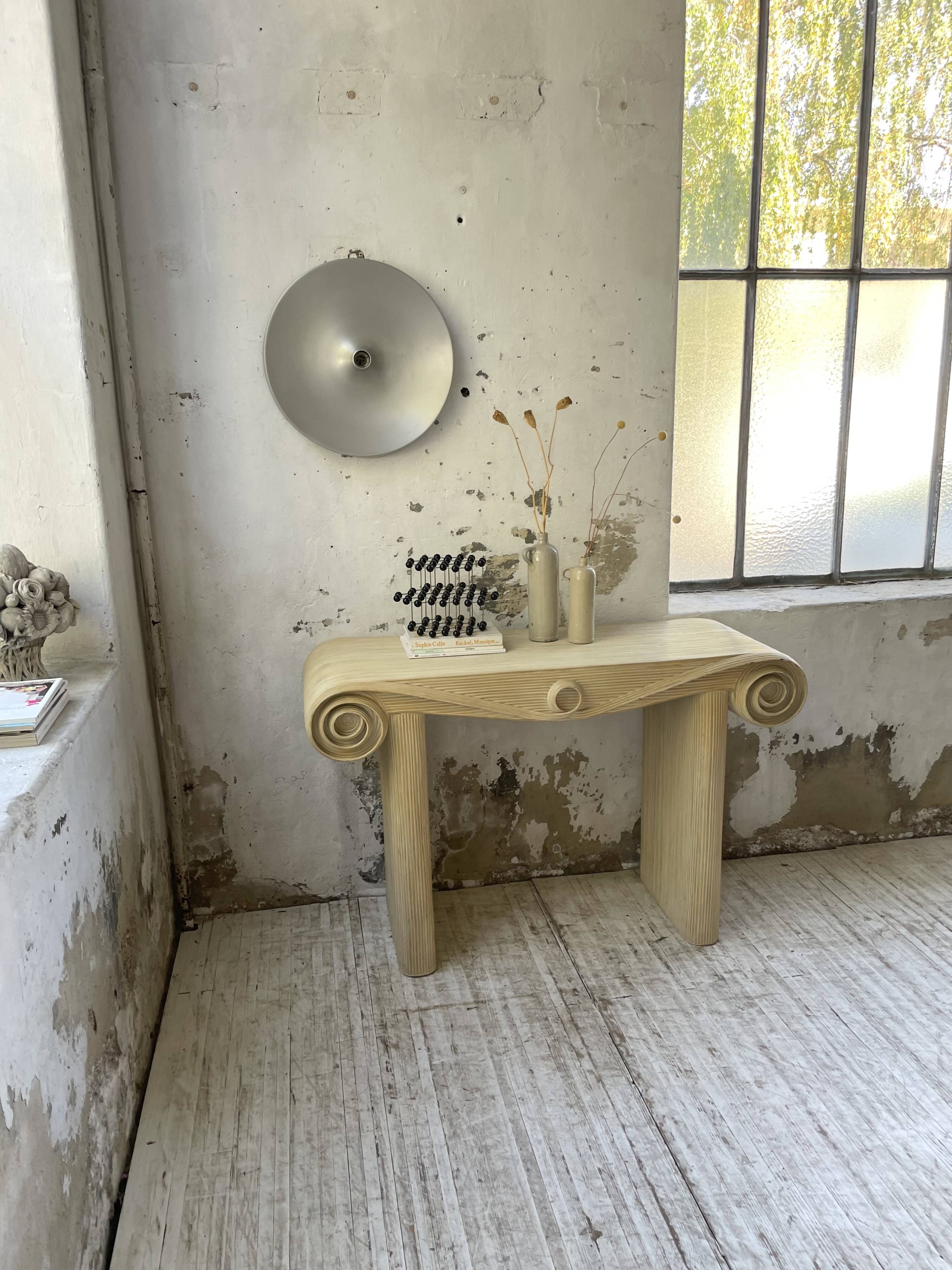 70s console in tropicalist rattan