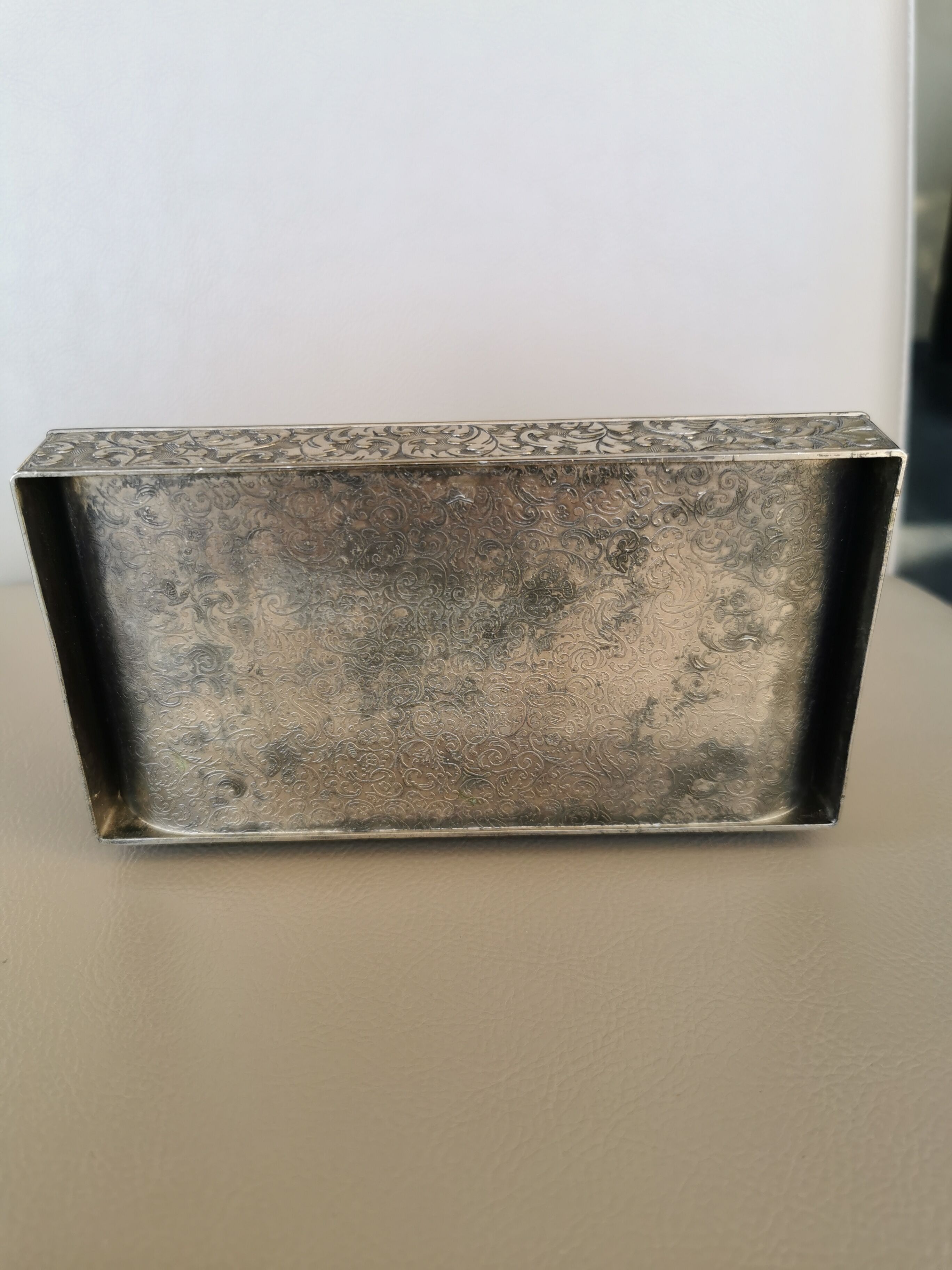 Old box in chiseled silver metal