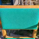 3 vintage bridge chairs with rounded armrests.