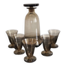5 liquor glasses on legs and their smoked glass carafe with gold edging