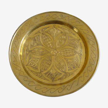 Oriental style chiseled metal plate