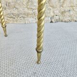 End of sofa, glass and twisted legs in gilded metal