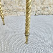 End of sofa, glass and twisted legs in gilded metal