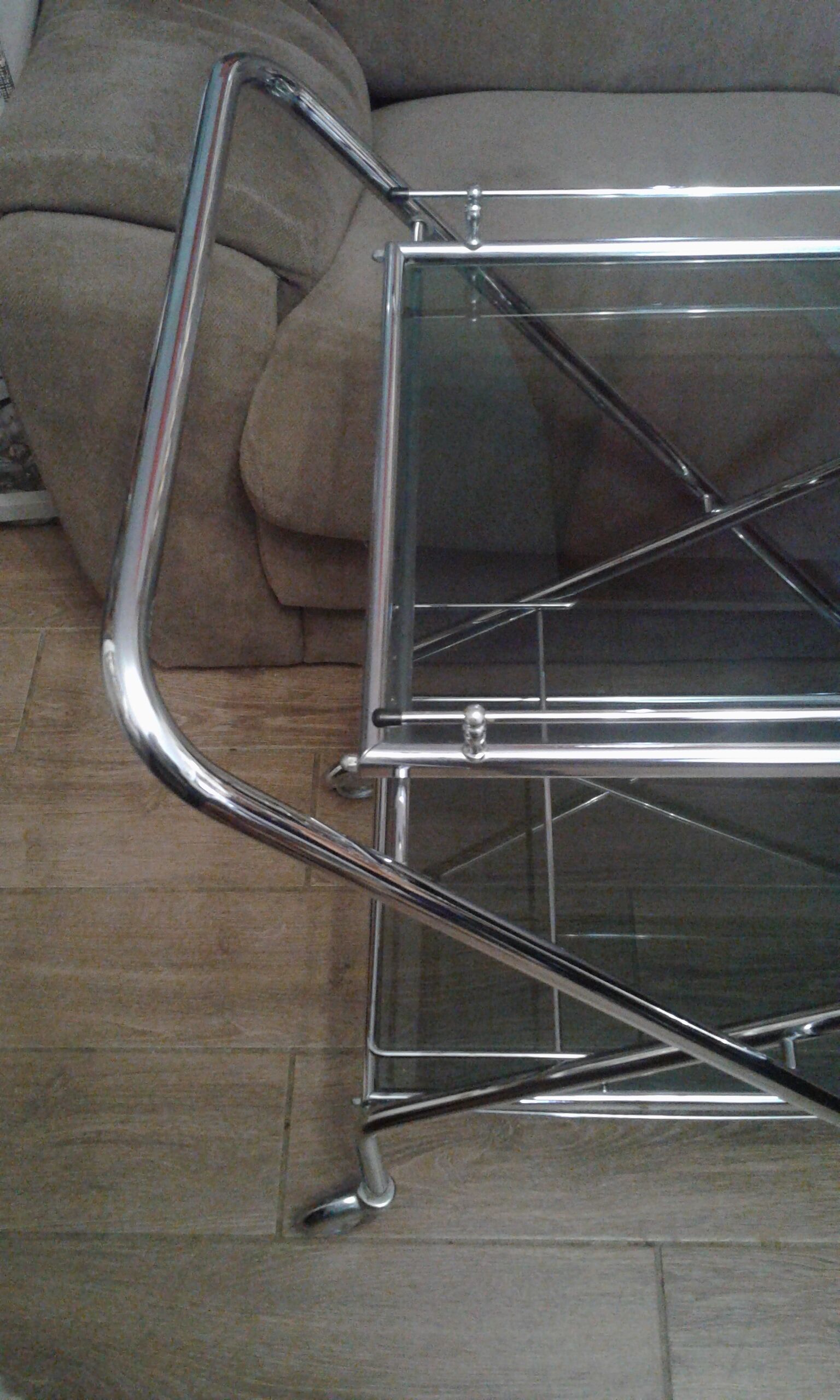 Chrome and smoked glass serving in the year 70