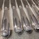 12 silver-plated table knives by Christofle Vendôme, 24.5cm