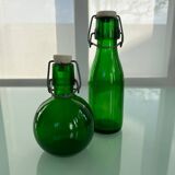 Duo of green bottles