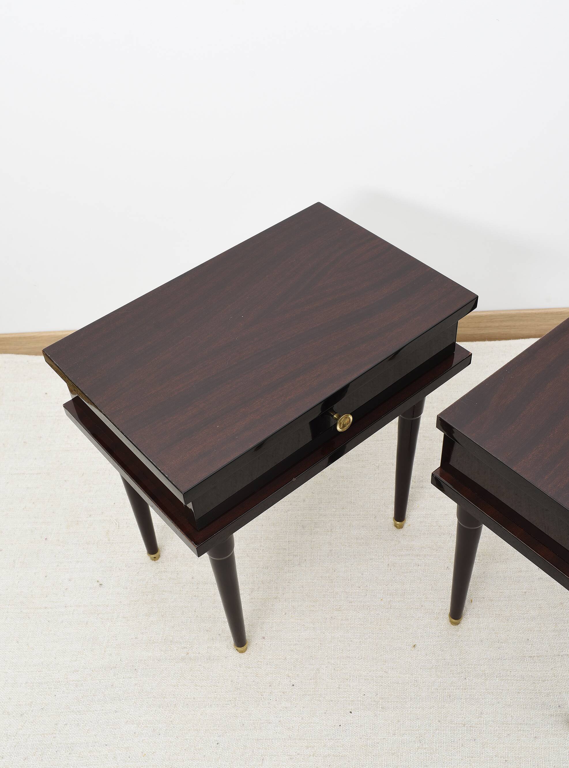 Pair of rosewood bedside tables, with drawer.
