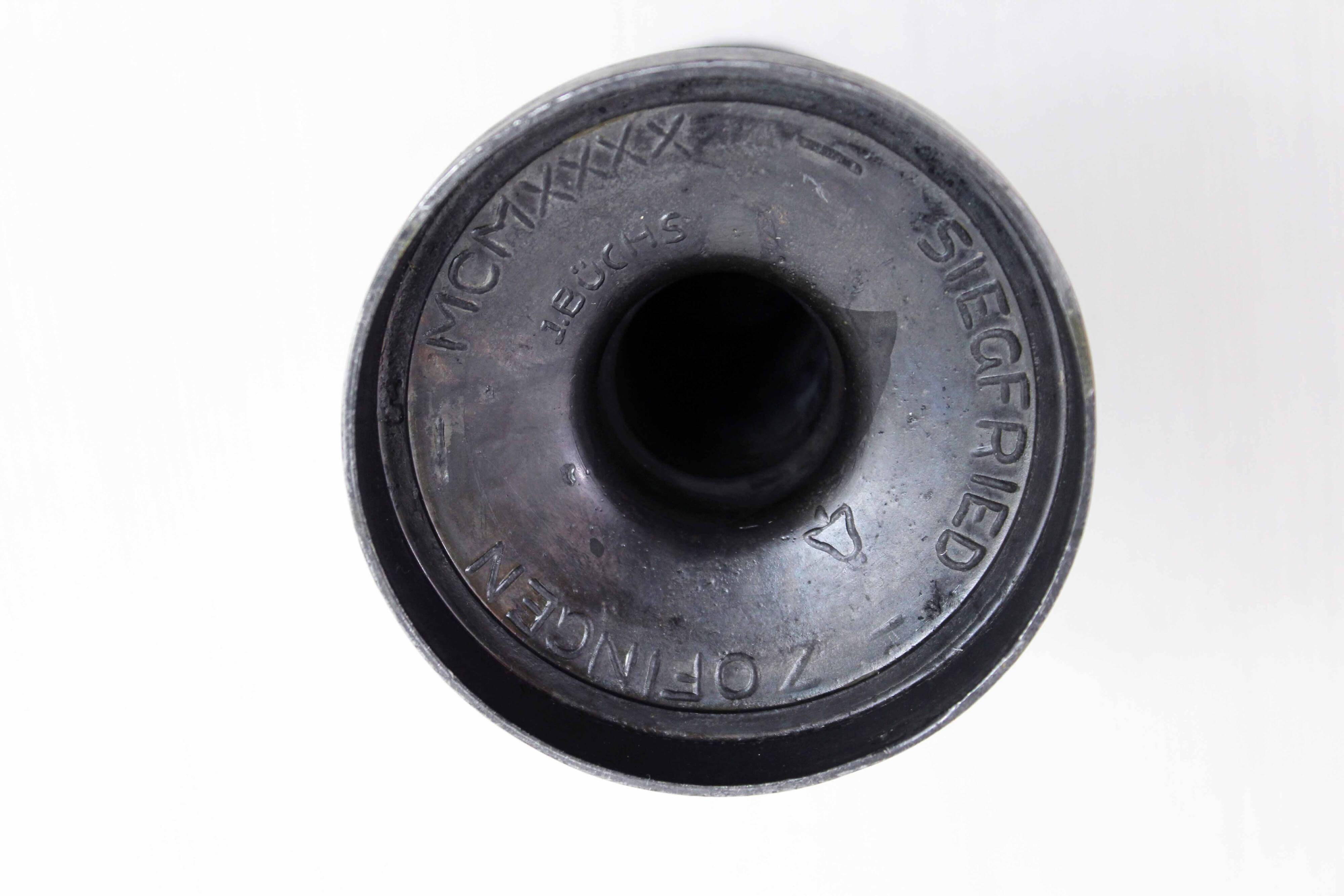 Serpent candlestick in pewter, early 20th century.