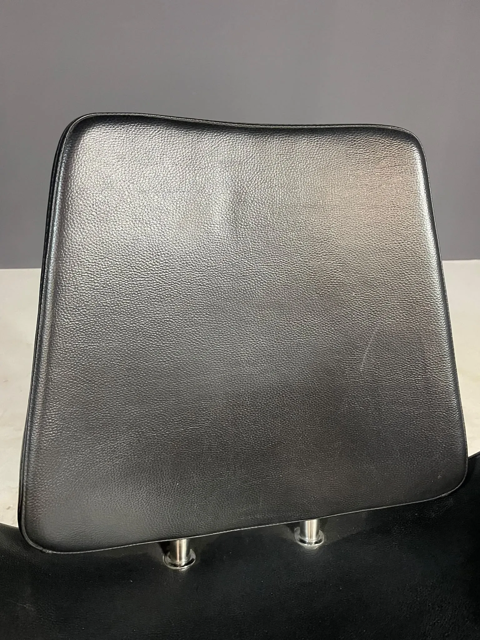Alipes black swivel salon chair with chrome star base by Giorgetto Giugiaro for Gamma & Bross, Italy, contemporary, 85 × 70 × 60 cm