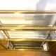 3-tier shelf in glass, mirror and brass