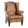 Large and comfortable sheepskin leather wingback chair with black piping