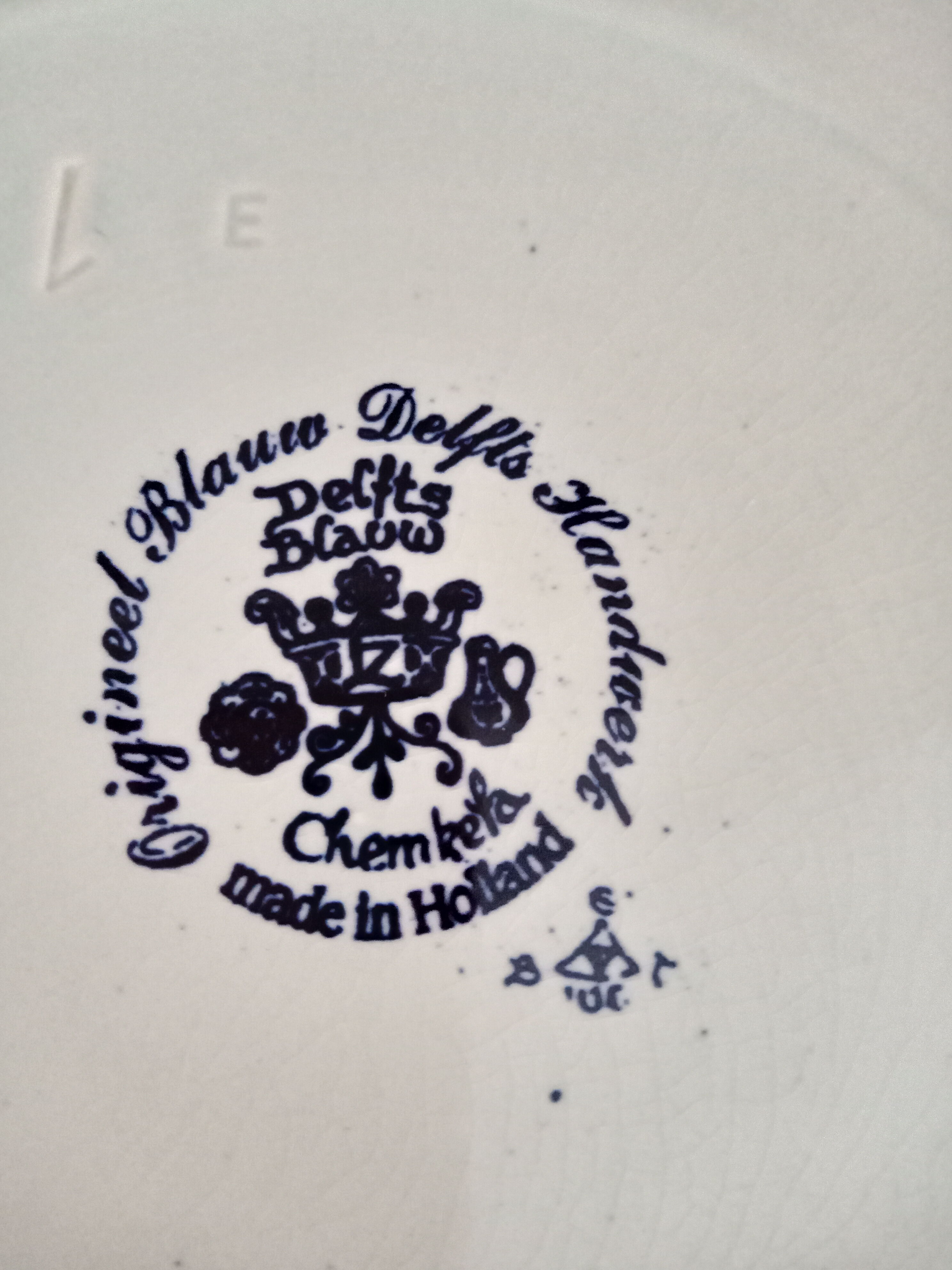 Round dish hollow Delfts decorating shepherdess and her sheep