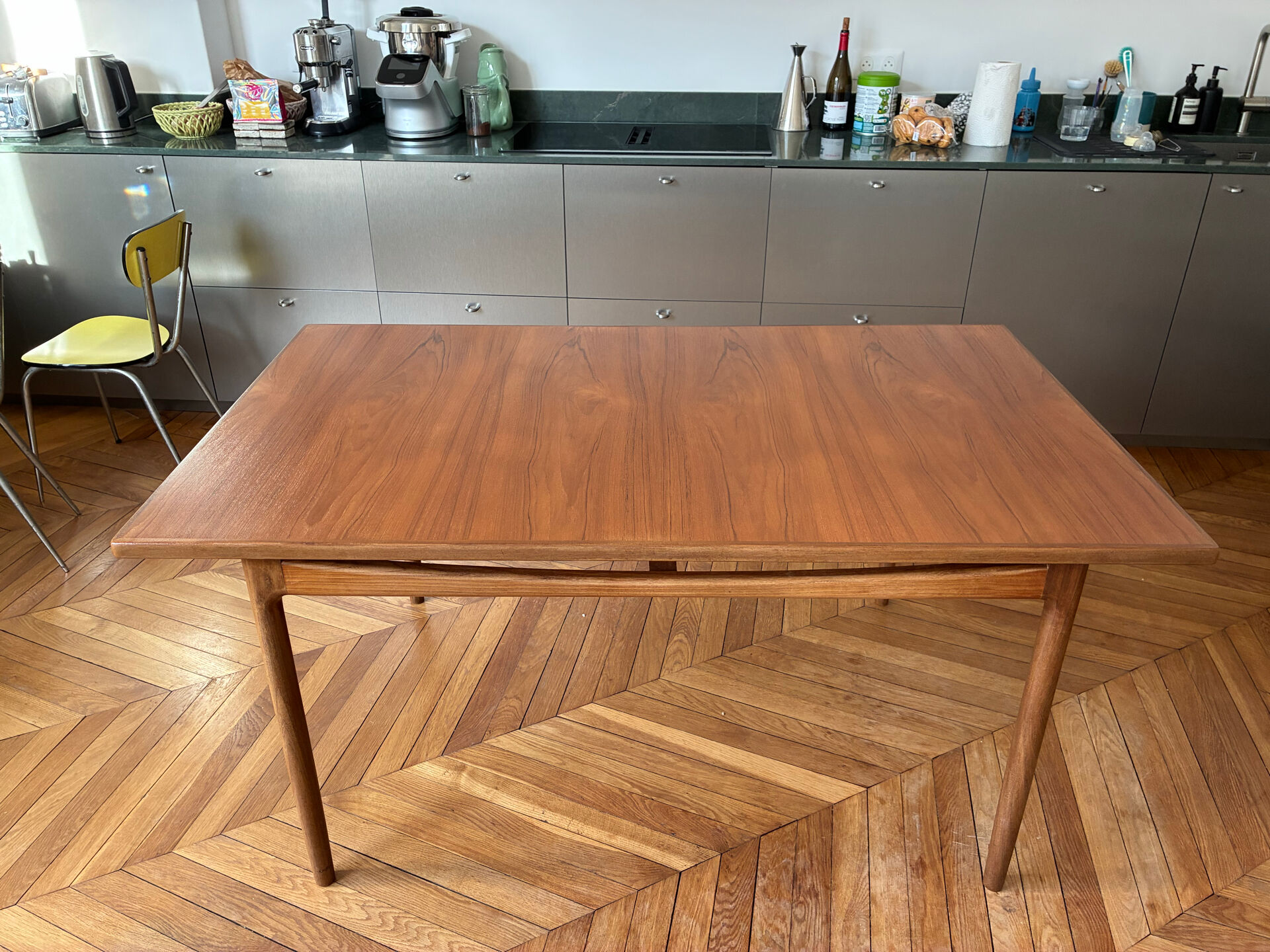 Extendable dining table in teak by Ib Kofod-Larsen