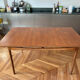 Extendable dining table in teak by Ib Kofod-Larsen