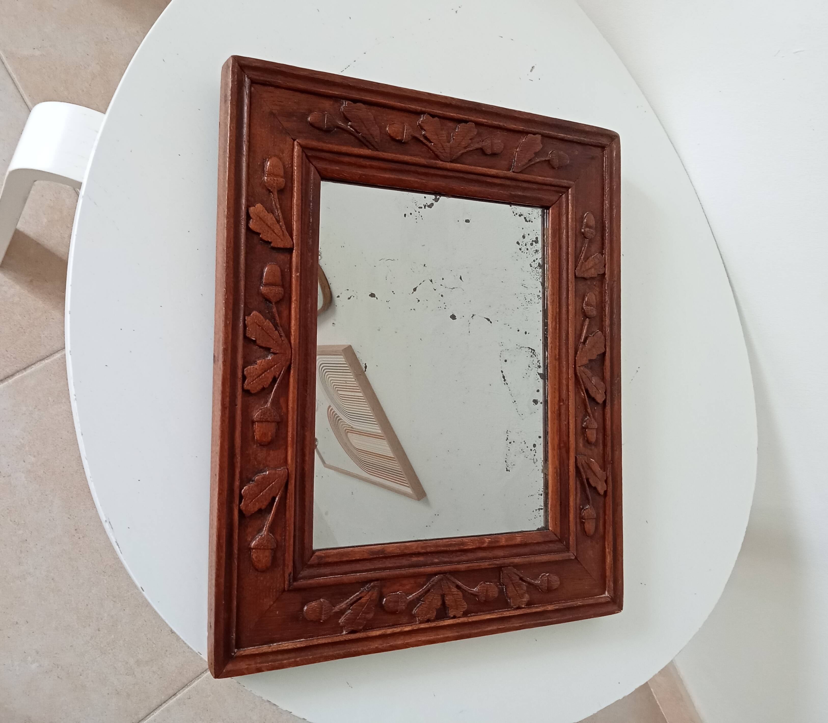 Antique mirror in carved wood