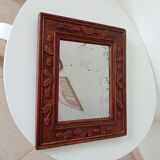 Antique mirror in carved wood