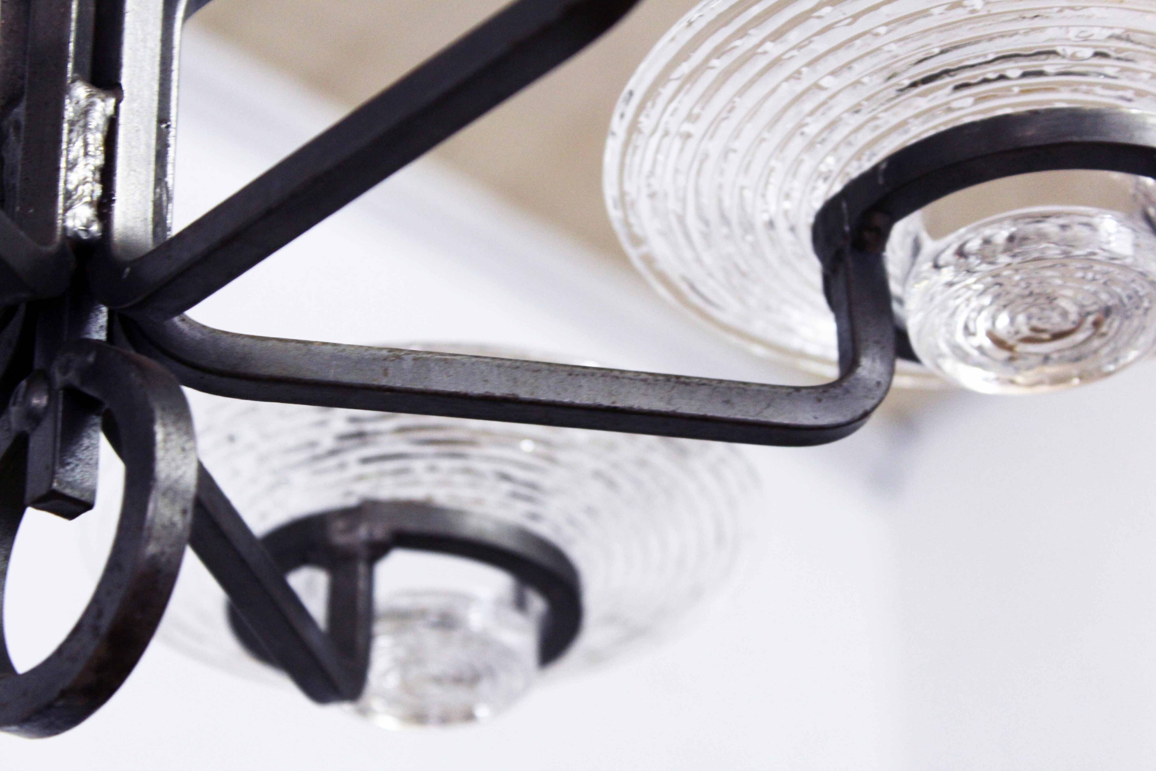 Art deco iron and glass candlestick by erik höglund