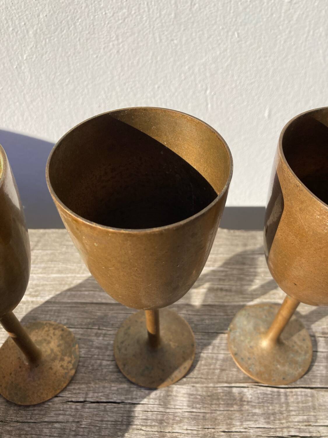 Copper brass stemmed glasses