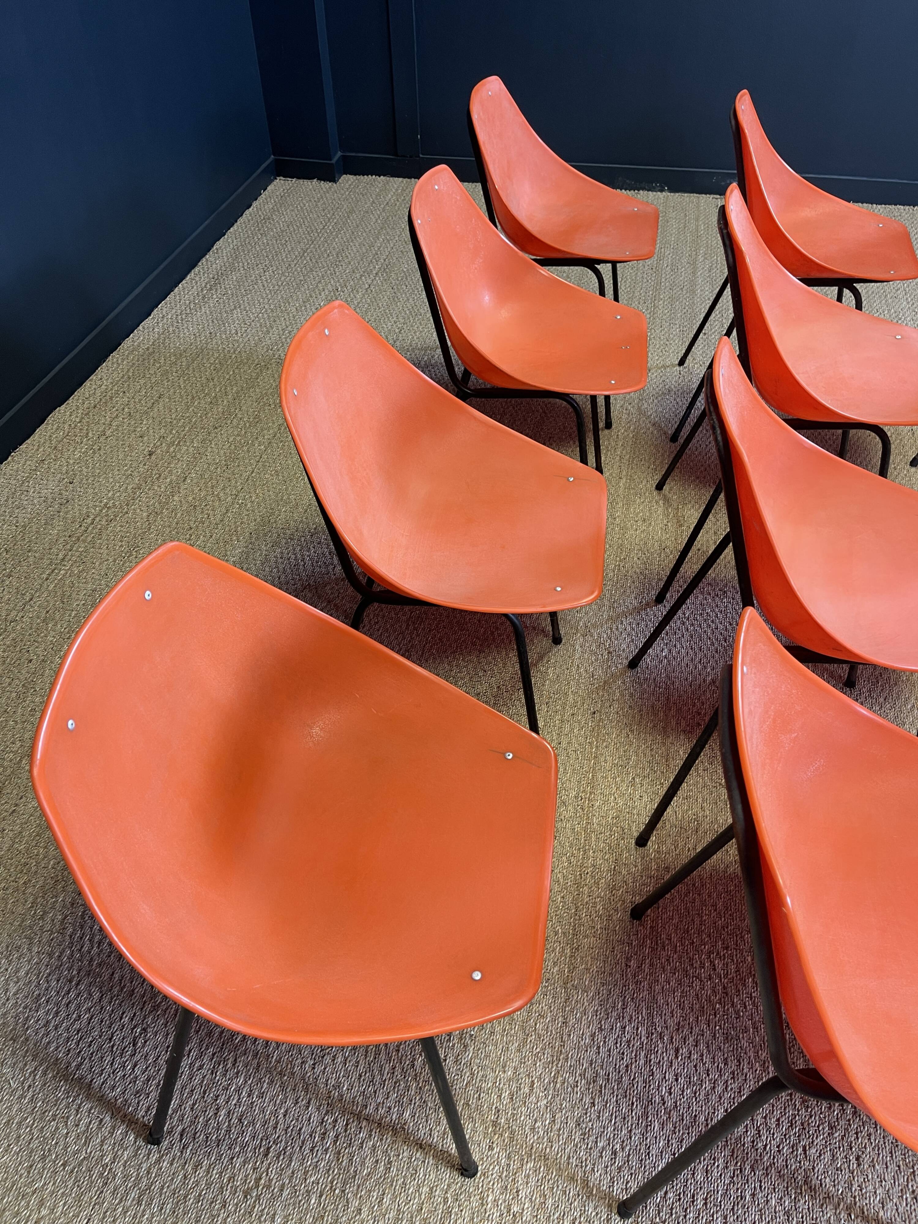 Set of 12 orange Guariche chairs