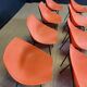 Set of 12 orange Guariche chairs