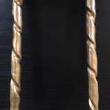 Pair of feet of golden lamps