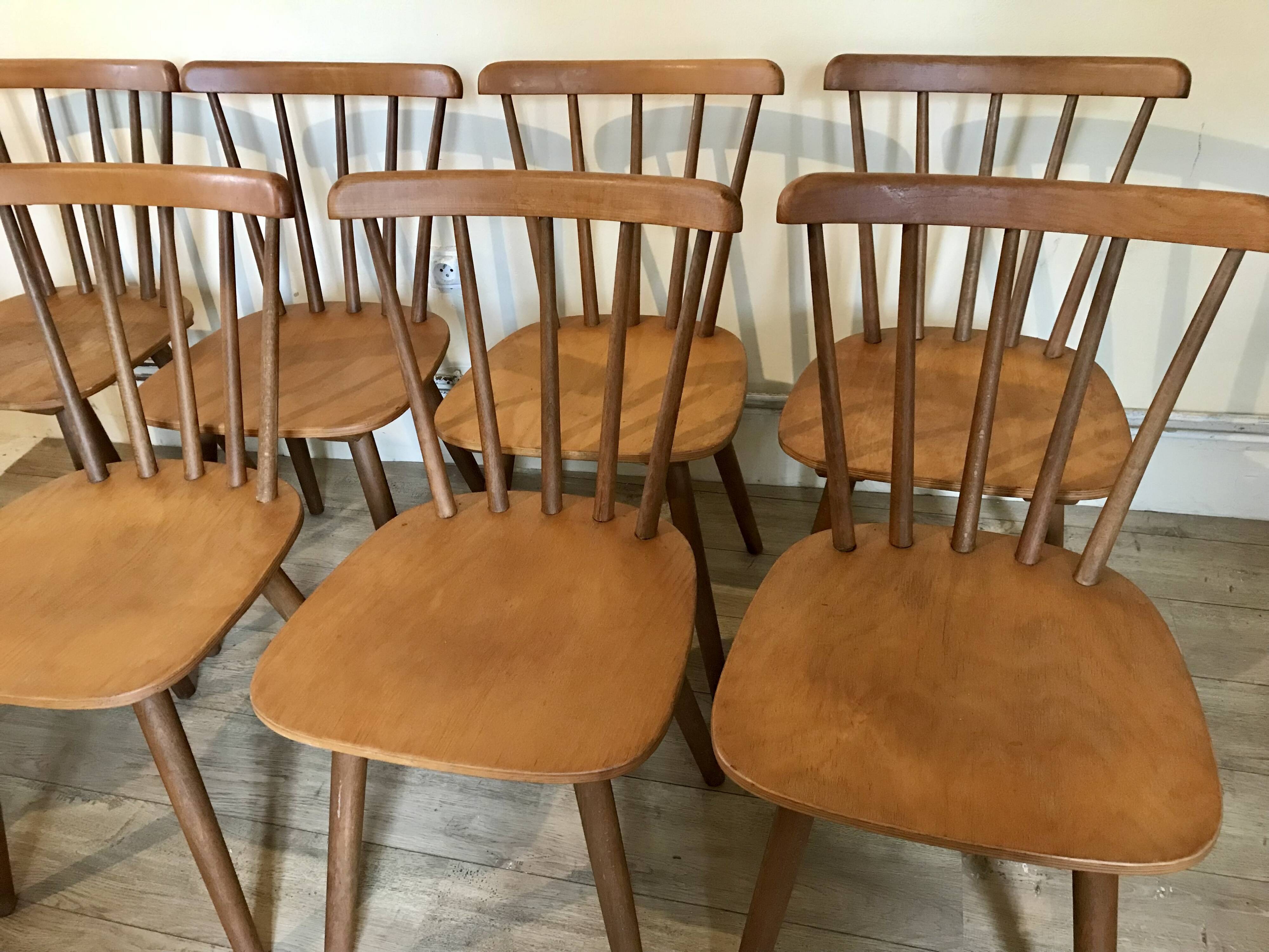 Set of 8 vintage chairs with bars and compass legs 1960
