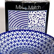 4 cups 11.5 cm diam. porcelain, white and blue, 4 different patterns