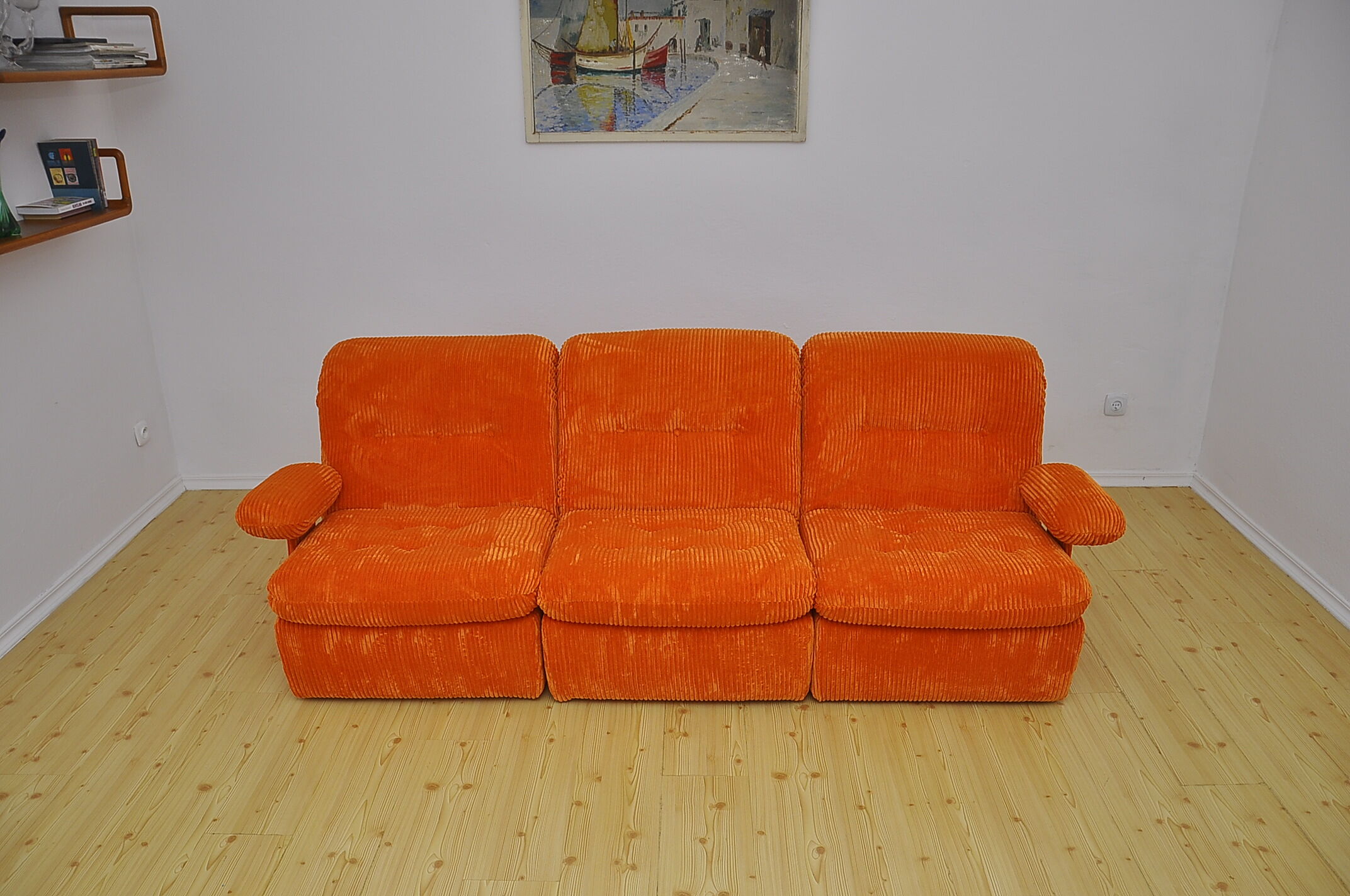 Orange corduroy modular sofa, 1970s.