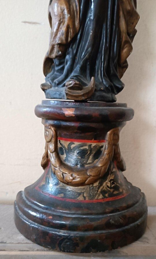 Ancient polychrome wooden sculpture representing the Virgin and Child, from