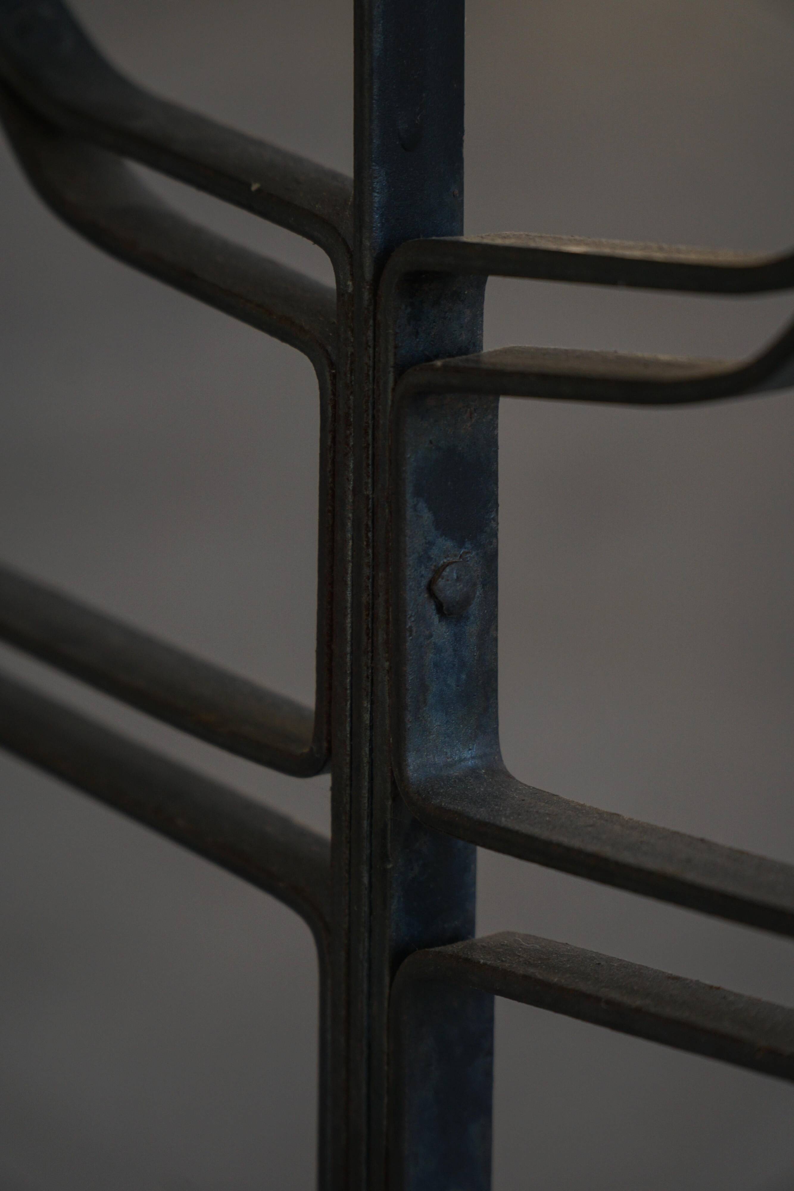 Brutalist Scandinavian candlestick in wrought iron and metal from the mid-20th century.