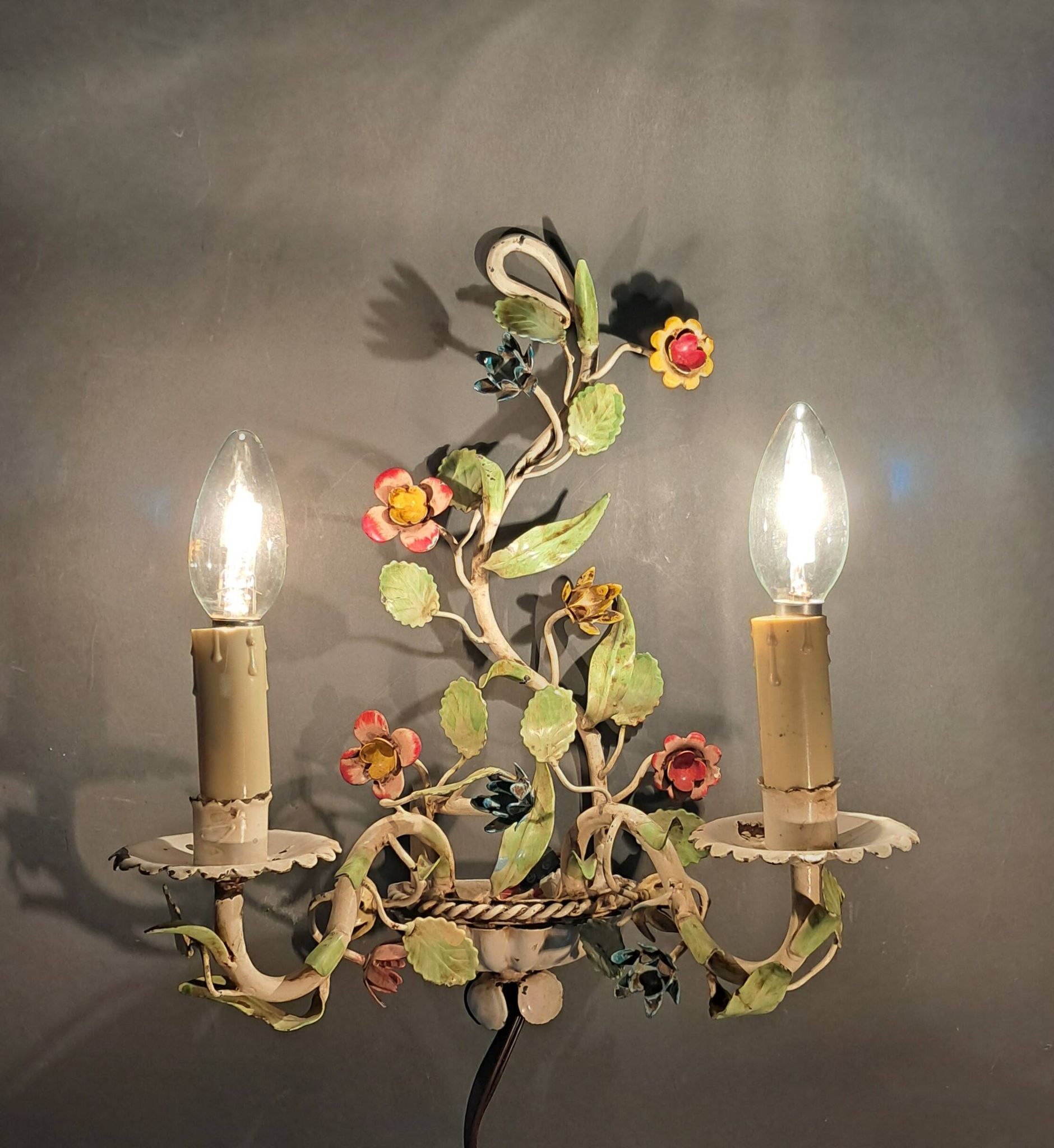 Two-light polychrome painted wrought iron wall lights, Italy 1950/1960.