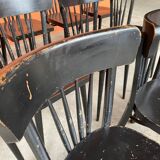 Set of 18 curved wooden bistro chairs with patina from the 60s