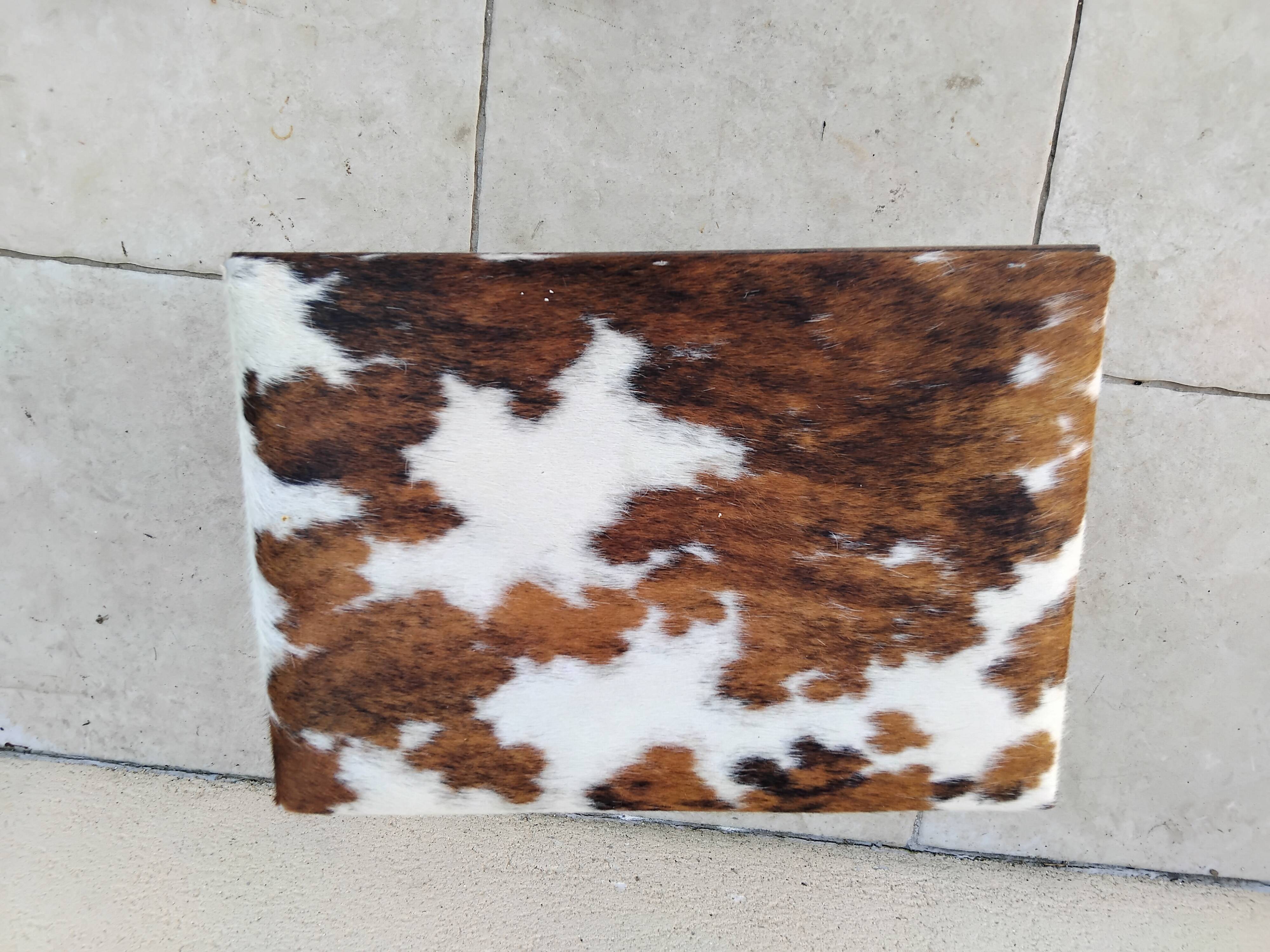 Vintage cowhide trunk stool