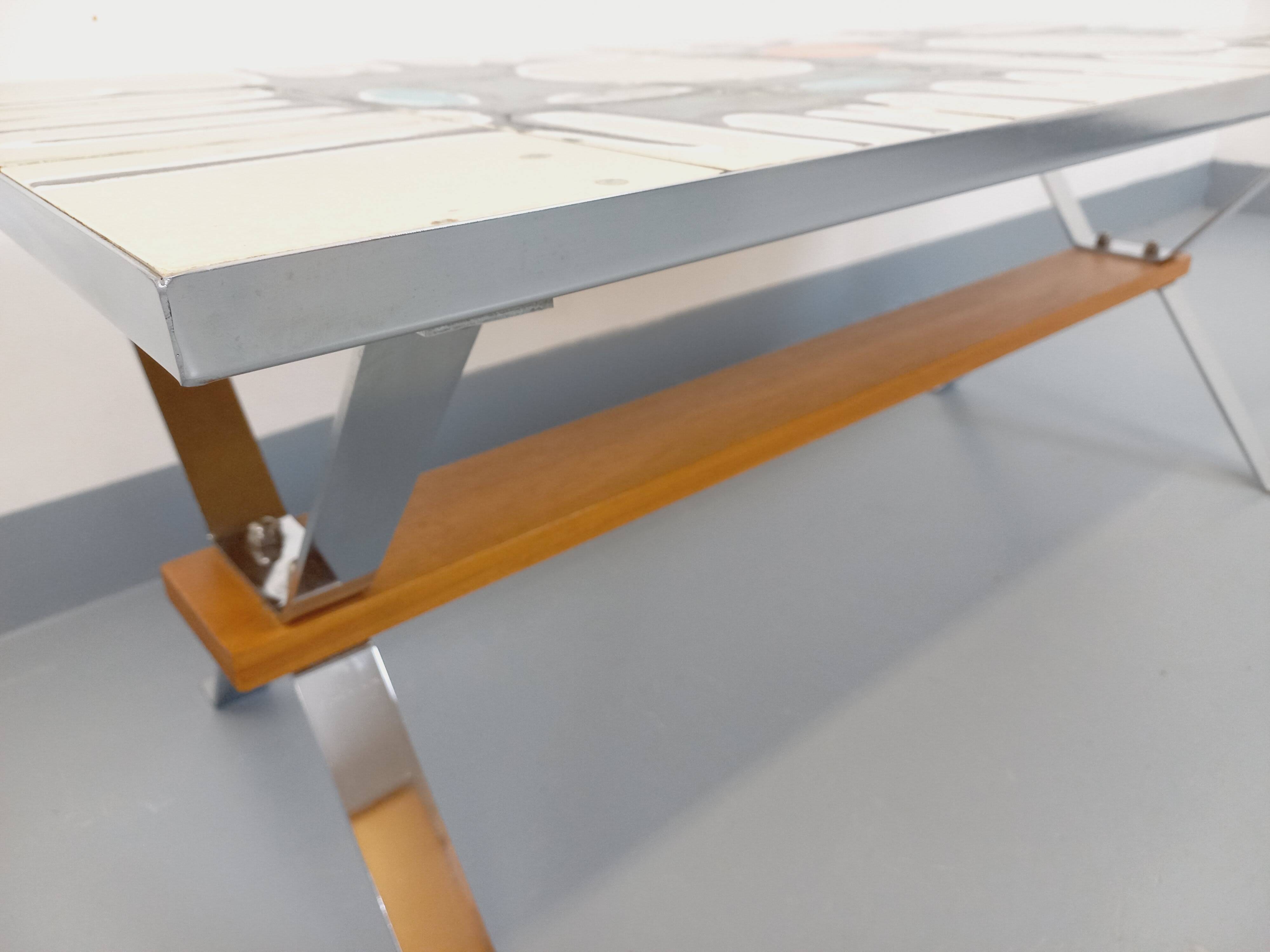Vintage coffee table from the 60s and 70s in ceramic, chrome metal, and wood.
