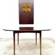 Danish round dining table in rosewood – 1950s design with butterfly extension.