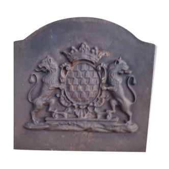 Plaque of chimney in fonte decorations with lions