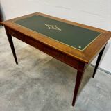 Louis XVI desk with green leather and shelves.