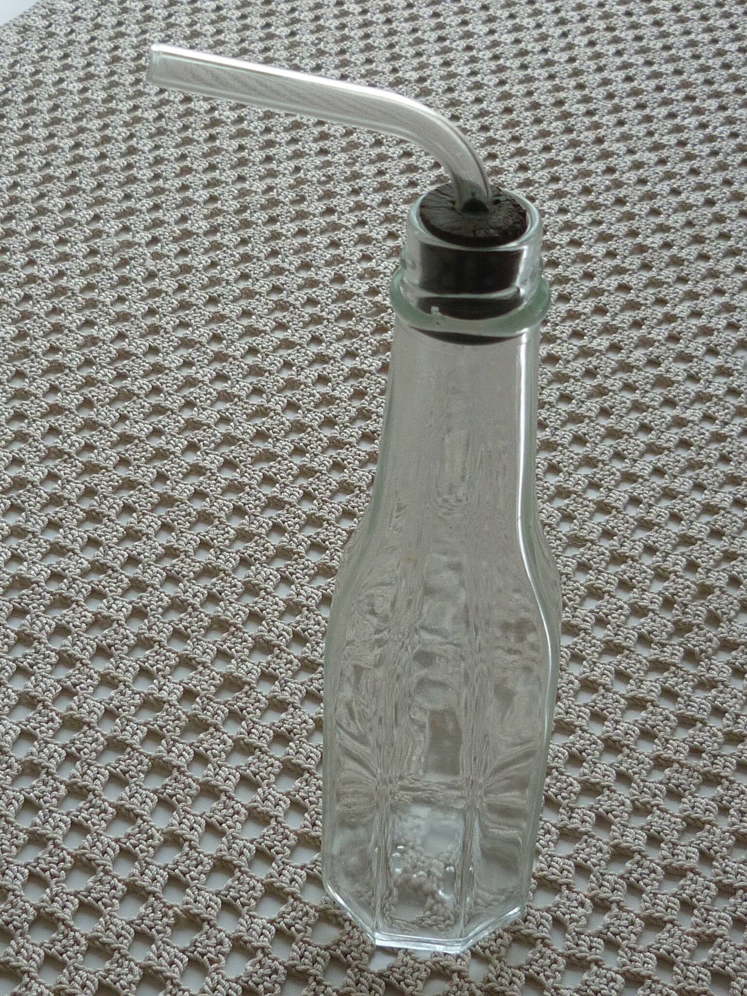 Old bottle with glass pipette