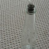 Old bottle with glass pipette