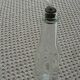 Old bottle with glass pipette