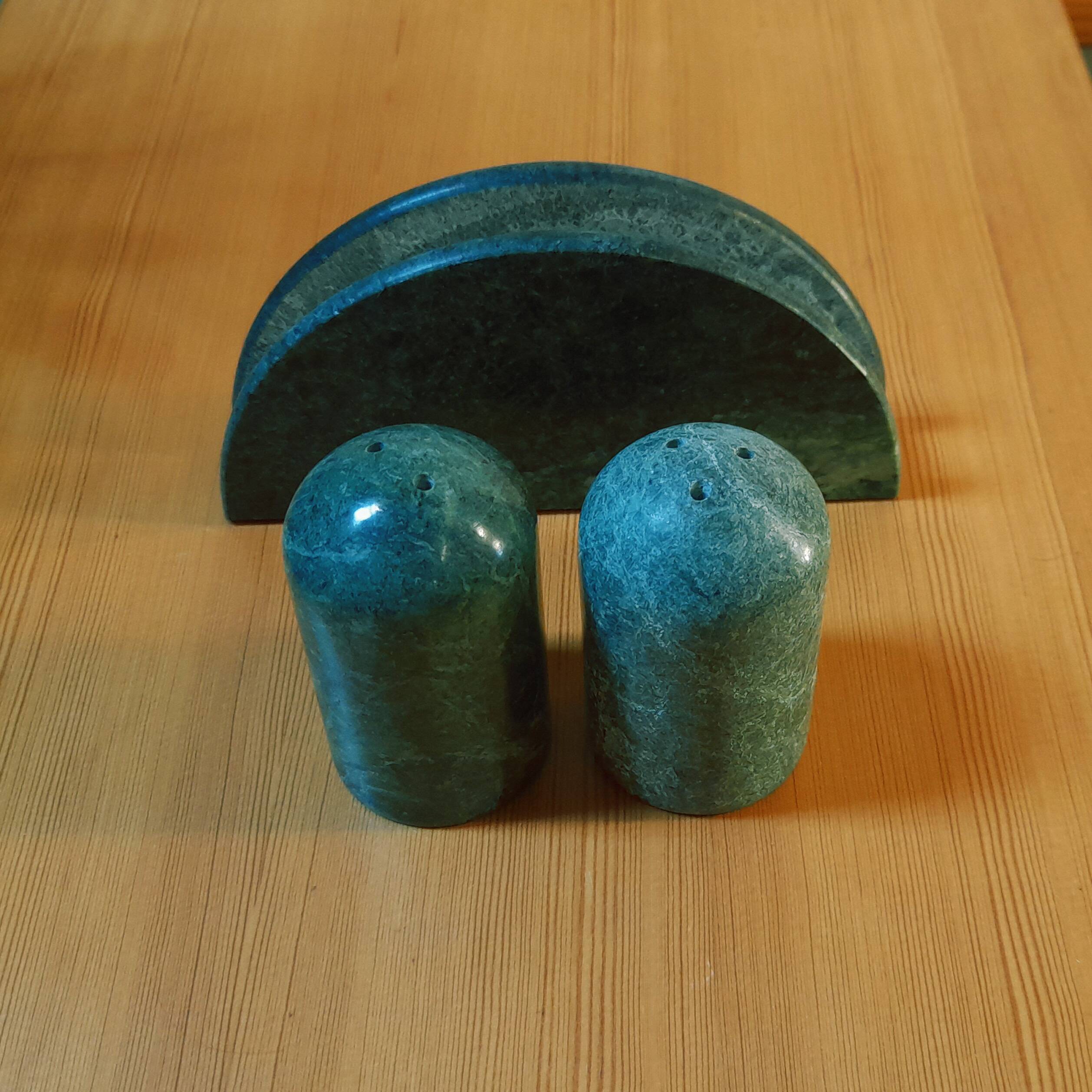 Trio of salt shakers, pepper shakers and napkin holders in green marble