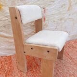 Brutalist chair in wood and boucle