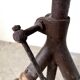 Tripod workshop stool in turned wood and cast iron — circa 1900