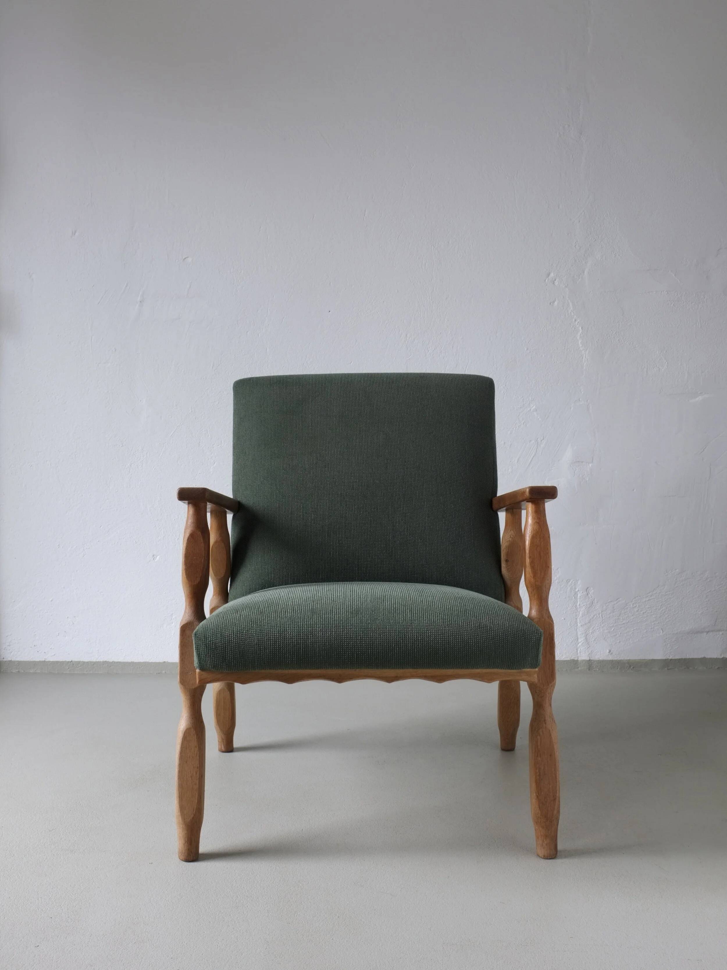 Henning Kjaernulf oak scalloped lounge chair | Denmark | 1950s