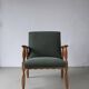 Henning Kjaernulf oak scalloped lounge chair | Denmark | 1950s