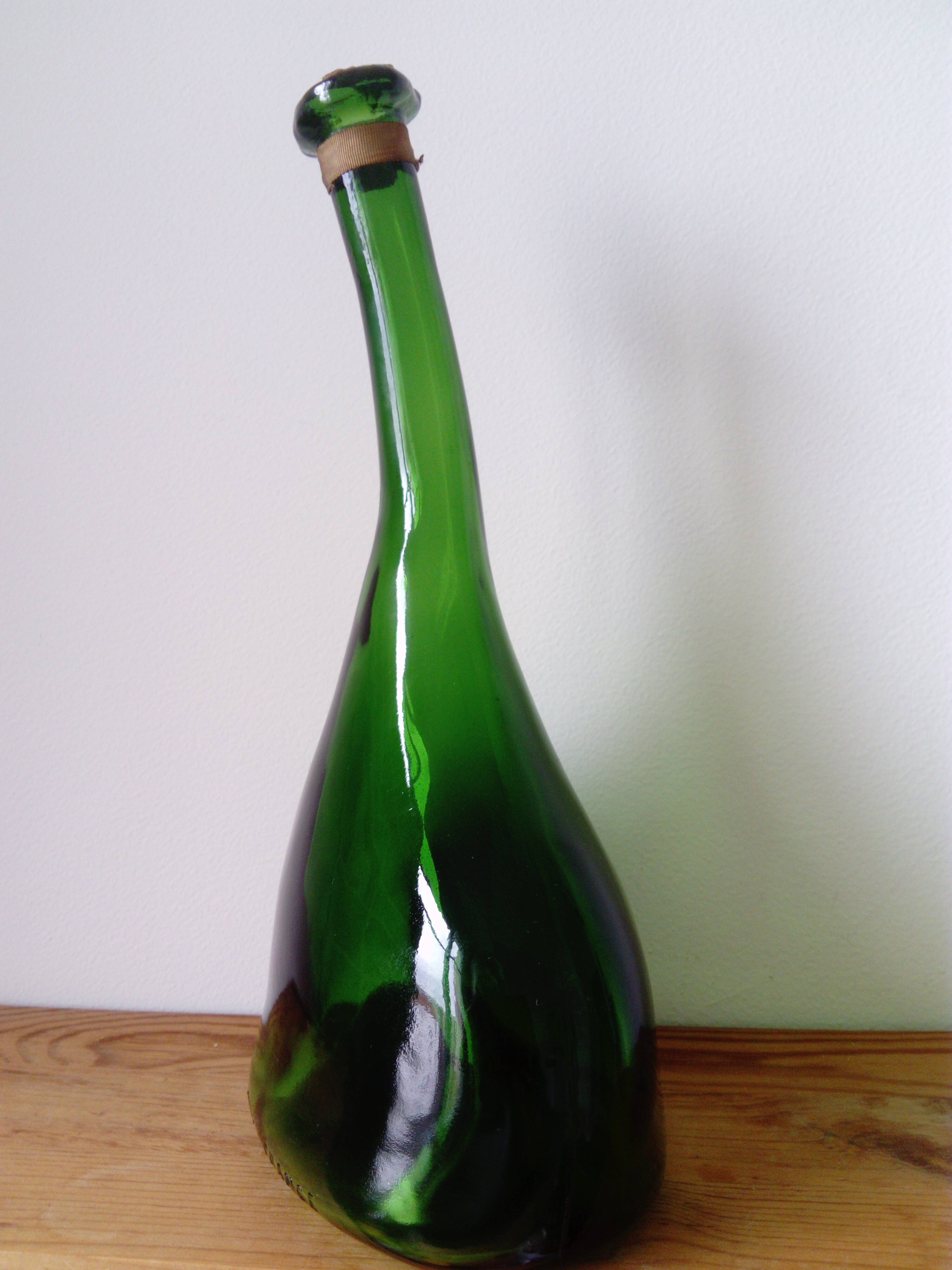 Old blown glass bottle, free form. Armagnac