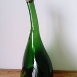 Old blown glass bottle, free form. Armagnac