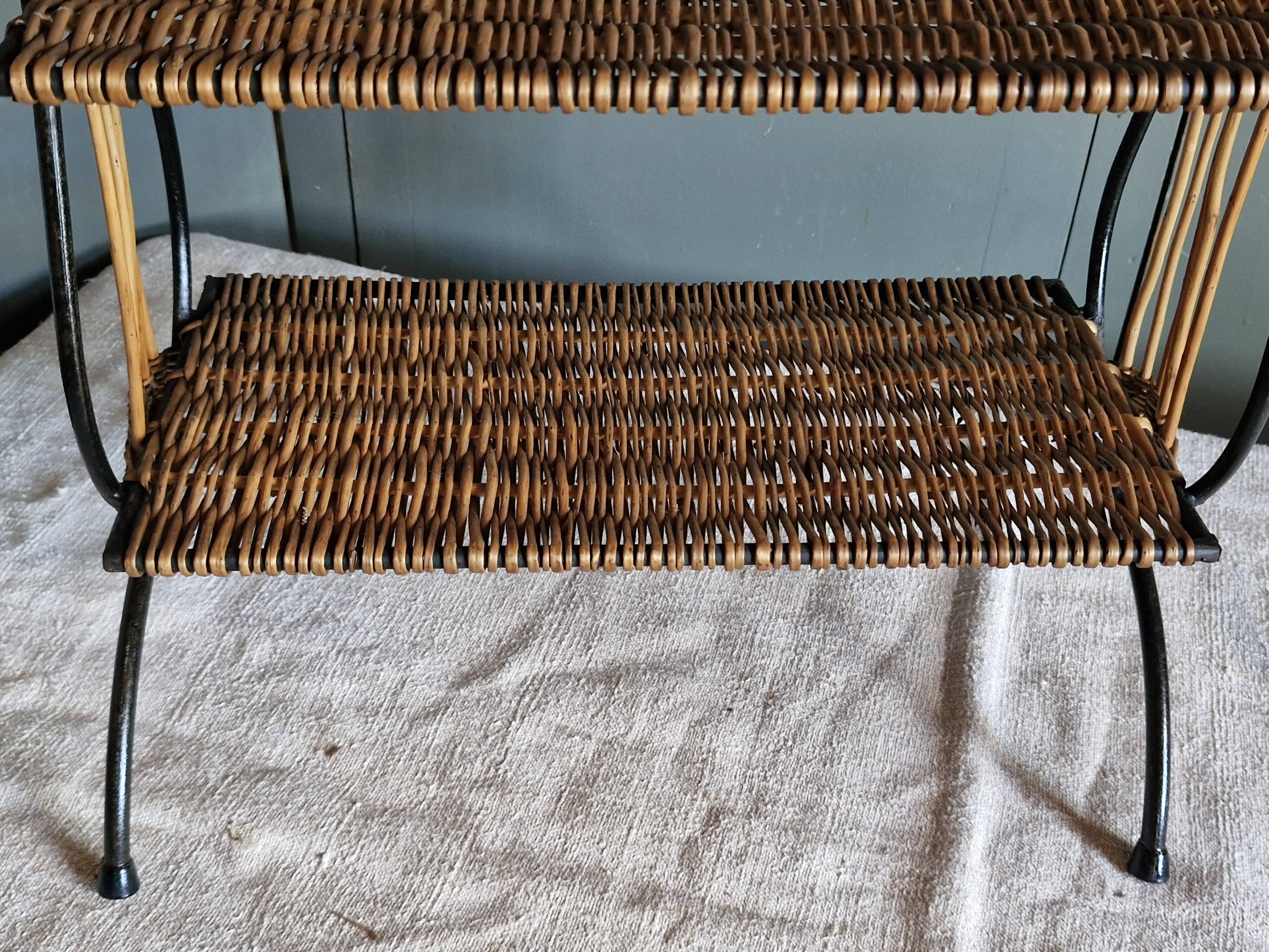 Small antique piece of furniture from the 1960s made of rattan and wrought iron in the shape of a lyre.