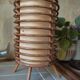 Cylindrical rattan lamp by Louis Sognot